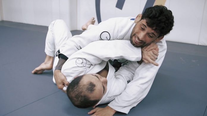 Escaping side control with an armlock