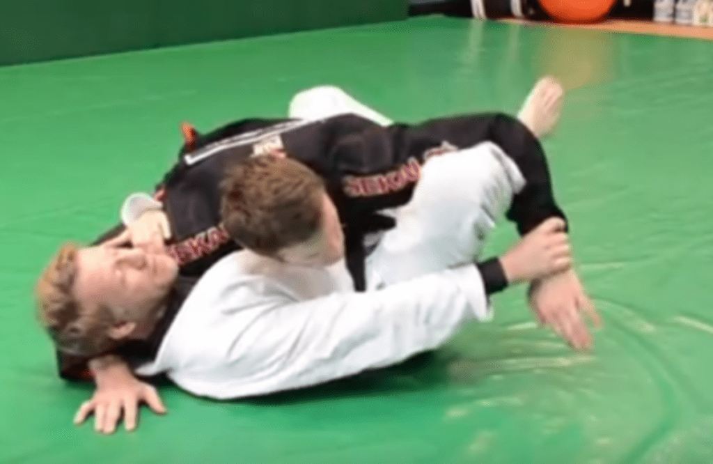 Escaping side control into an armlock